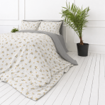 Seersucker bedding set „Sonnet“. Microfiber bedding sets, 200x200 cm, 200x220 cm. Pillowcases with small yellowish blossoms and grey-green leaves.