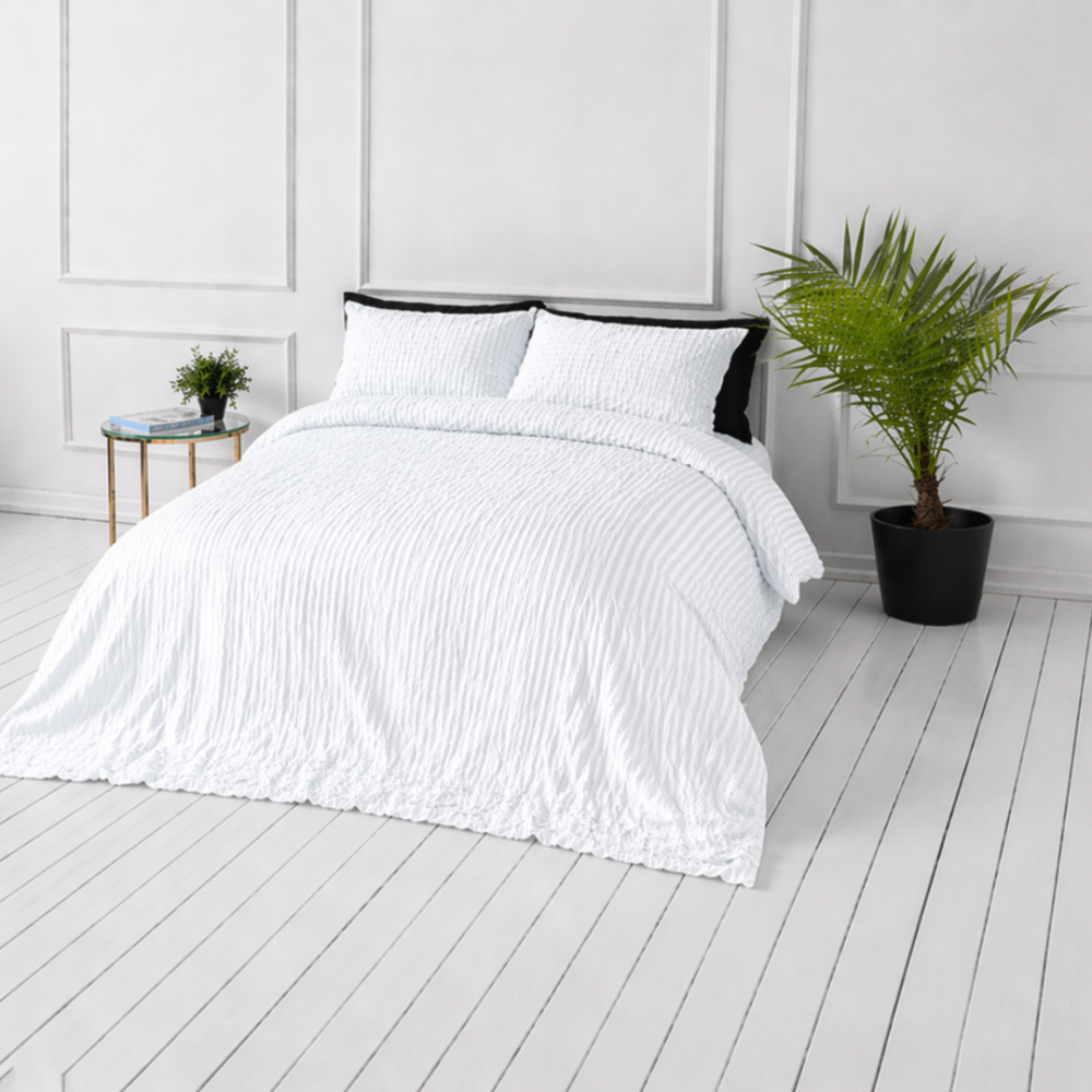 Cotton seersucker bedding set „Kora White“. Bedding sets 155x200, 140x200 cm, 150x200 cm, 160x200 cm, 180x200 cm, 200x200 cm, 200x220 cm, 220x240 cm. Timeless white bedding for a calm and clean bedroom.
