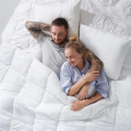 Pillow “Familon Original Pillow”. Smooth white pillow with subtle design familon