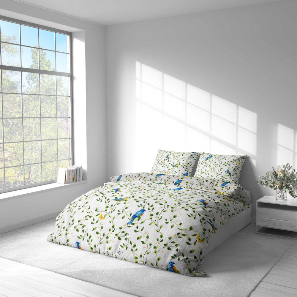 Bedding Set „Birds in Bloom“. Patterned bedding sets, 140x200 cm, 200x200 cm, 200x220 cm, 220x240 cm. Blue birds and delicate green branches on a light background, giving a sense of lightness and freshness.