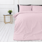 Bedding Set „Bubblegum“. Bedding sets 155x200, 140x200 cm, 150x200 cm, 160x200 cm, 180x200 cm, 200x200 cm, 200x220 cm, 220x240 cm. Pastel pink bedding with two pillows in a bright bedroom.