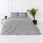 Bedding Set „Grandiflora“. Gray bedding sets, 140x200 cm, 200x200 cm, 200x220 cm. The composition is dominated by subtle white botanical accents on a grey background, giving the pattern an elegant lightness. Bedding Set „Grandiflora“. Gray bedding sets, 140x200 cm, 200x200 cm, 200x220 cm. The composition is dominated by subtle white botanical accents on a grey background, giving the pattern an elegant lightness.