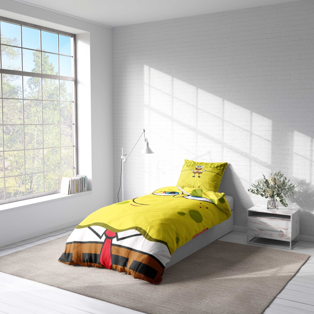 Bedding Set „Happy Sponge“. Kids bedding, 140x200 cm. Vibrant yellow bedding set featuring a prominent spongebob squarepants design.
