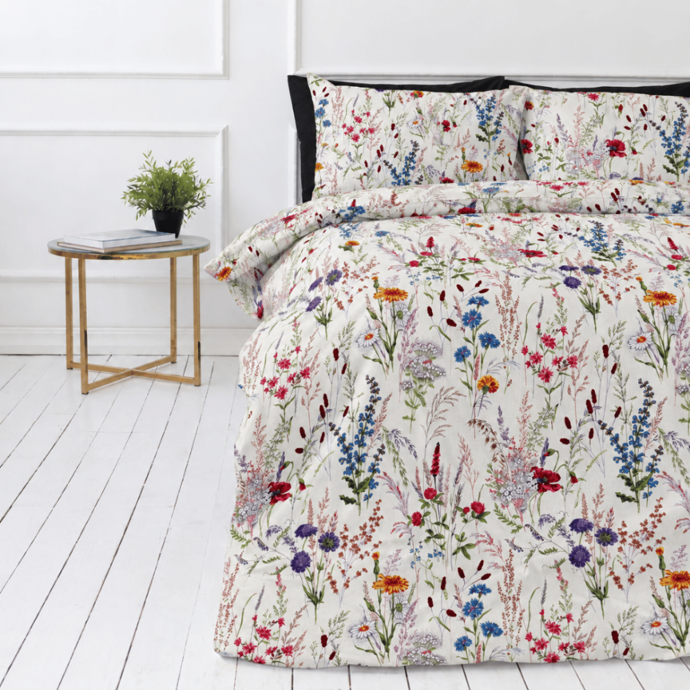 Bedding Set „Ophelia“. Bedding sets 155x200, 140x200 cm, 150x200 cm, 160x200 cm, 180x200 cm, 200x200 cm, 200x220 cm, 220x240 cm. Bedding with multicoloured blooms, green leaves and slender stems on a white background. Bedding Set „Ophelia“. Bedding sets 155x200, 140x200 cm, 150x200 cm, 160x200 cm, 180x200 cm, 200x200 cm, 200x220 cm, 220x240 cm. Bedding with multicoloured blooms, green leaves and slender stems on a white background.