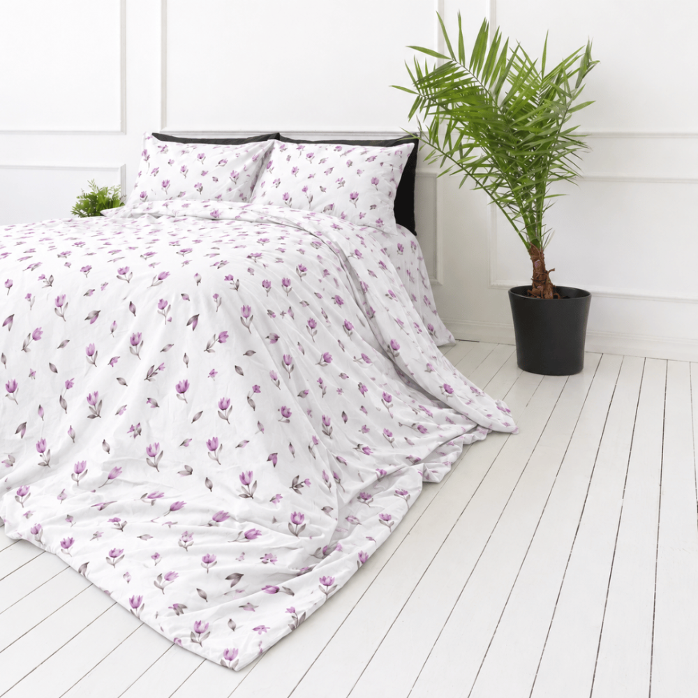 Bedding Set „Tulips“. Bedding sets 155x200, 140x200 cm, 150x200 cm, 160x200 cm, 180x200 cm, 200x200 cm, 200x220 cm, 220x240 cm. White pillowcases with lilac tulips and brownish stems. Bedding Set „Tulips“. Bedding sets 155x200, 140x200 cm, 150x200 cm, 160x200 cm, 180x200 cm, 200x200 cm, 200x220 cm, 220x240 cm. White pillowcases with lilac tulips and brownish stems.
