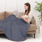 Plaid „Blue Shadow fleece blanket“. Blankets, 200x220 cm. Soft and cozy light blue throw, decorated with horizontal embossed lines.