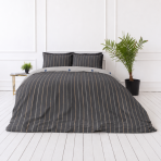 Sateen Bedding Set „Tones“. Mako cotton sateen bedding, 140x200 cm, 200x200 cm, 200x220 cm. Contemporary bedding in dark grey, showcasing chic vertical lines in grey, white, and hints of orange Sateen Bedding Set „Tones“. Mako cotton sateen bedding, 140x200 cm, 200x200 cm, 200x220 cm. Contemporary bedding in dark grey, showcasing chic vertical lines in grey, white, and hints of orange