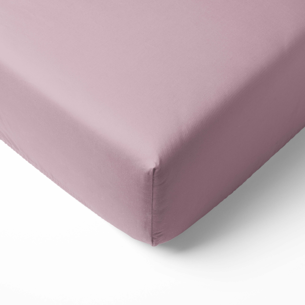 Jersey fitted sheet “Hushed Rose jersey”. Fitted sheets 200x200, 90x200 cm, 140x200 cm, 160x200 cm, 180x200 cm, 200x220 cm. Pastel pink fitted sheet with a minimalist plain look