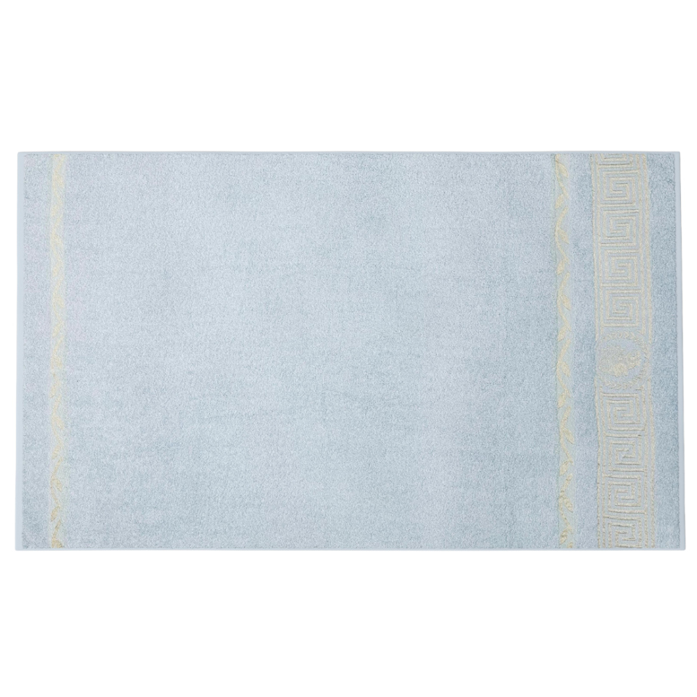 Bath towel “Glacier Olympian”, 70x140 cm. Pastel blue towel with golden ornamentation at the top and bottom.