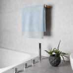 Bath towel “Glacier Olympian”, 70x140 cm. Pastel blue towel with a greek golden ornament pattern at the bottom. Bath towel “Glacier Olympian”, 70x140 cm. Pastel blue towel with a greek golden ornament pattern at the bottom.