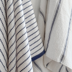 Bath towel “Marine Stripe”, 70x130 cm. White towel with thin blue lines and contrasting border Bath towel “Marine Stripe”, 70x130 cm. White towel with thin blue lines and contrasting border