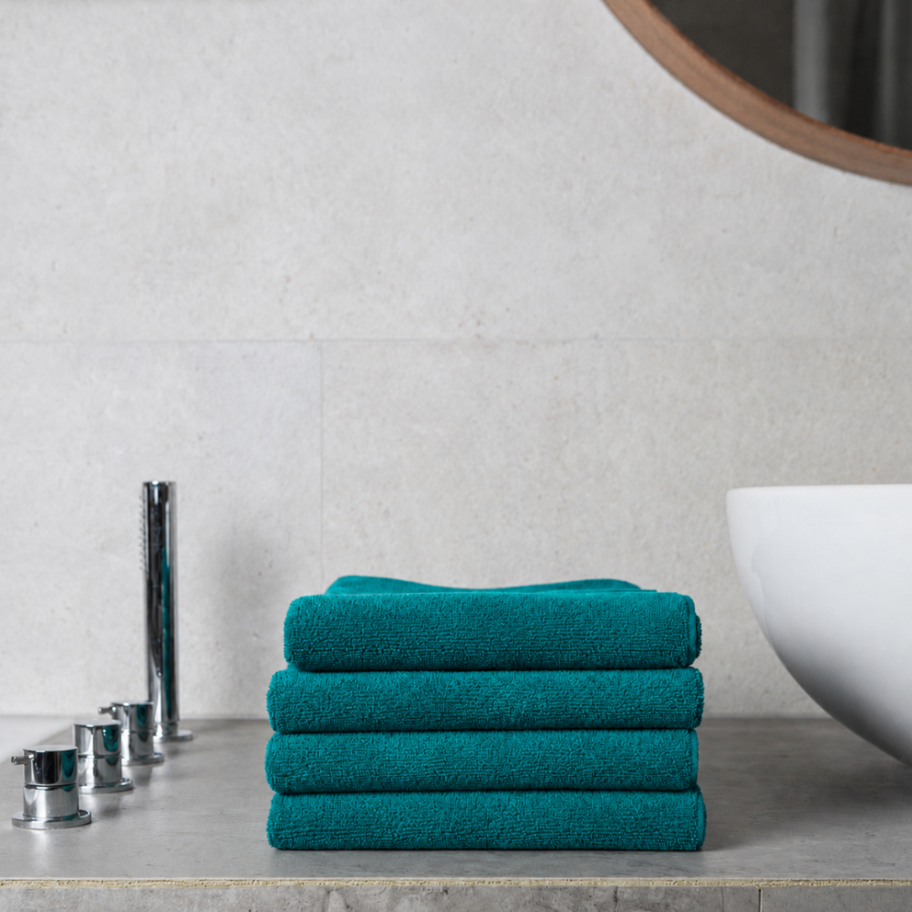 Bath Towel “Pond Softness”, 70x140 cm. Deep blue-green towel with a gentle raised texture Bath Towel “Pond Softness”, 70x140 cm. Deep blue-green towel with a gentle raised texture