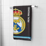 Bath towel “Real Madrid Black Towel”, 70x140 cm. Black real madrid football club themed towel hanging in the bathroom, with the club logo and lettering clearly visible.