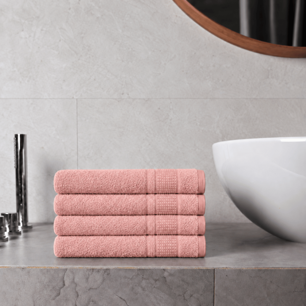 Bath towel “Royal Coral towel”, 70x140 cm. Powder pink bath towel with a decorative border. Bath towel “Royal Coral towel”, 70x140 cm. Powder pink bath towel with a decorative border.