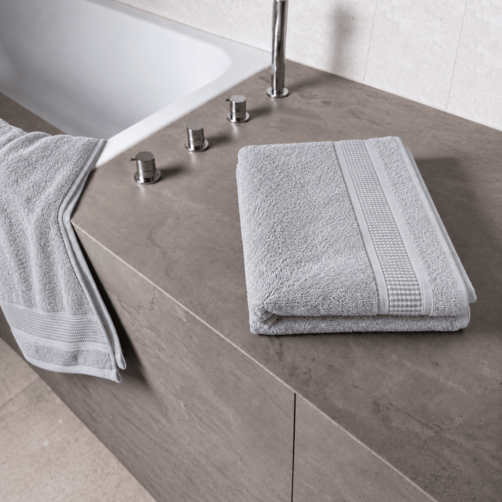 Bath towel “Royal Light Grey towel”, 70x140 cm. Soft grey towel with narrow edging along the decorative band.