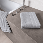 Bath towel “Royal Light Grey towel”, 70x140 cm. Soft grey towel with narrow edging along the decorative band.