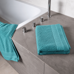Bath towel “Royal Turquoise towel”, 70x140 cm. Turquoise bath towel with a textured surface and decorative edging. Bath towel “Royal Turquoise towel”, 70x140 cm. Turquoise bath towel with a textured surface and decorative edging.