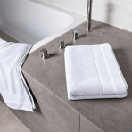 Bath towel “Royal White towel”, 70x140 cm. White bath towel with a textured surface and decorative edging. Bath towel “Royal White towel”, 70x140 cm. White bath towel with a textured surface and decorative edging.